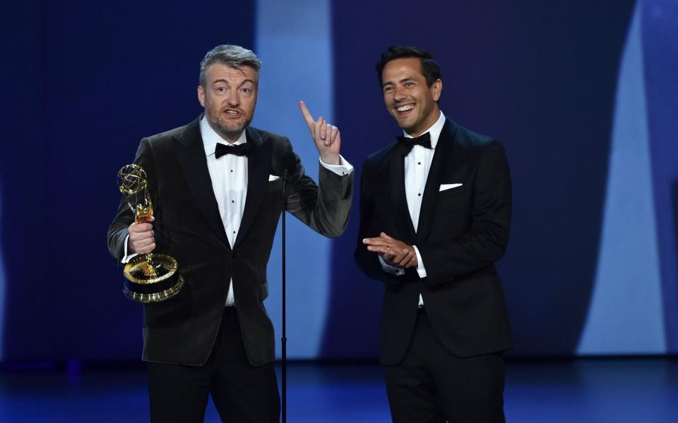 Charlie Brooker receiving an Emmy for Outstanding Writing for a Limited Series in 2018 - AFP