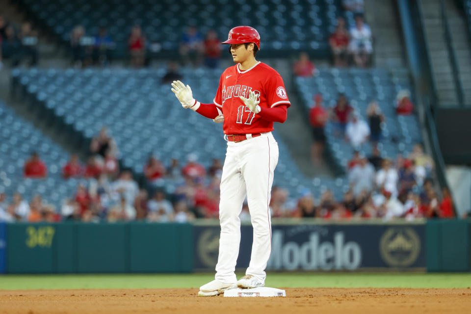 Los Angeles Angels' Shohei Ohtani stands at third base during the first inning of a baseball game against the Detroit Tigers in Anaheim, Calif., Monday, Sept. 5, 2022. (AP Photo/Ringo H.W. Chiu)