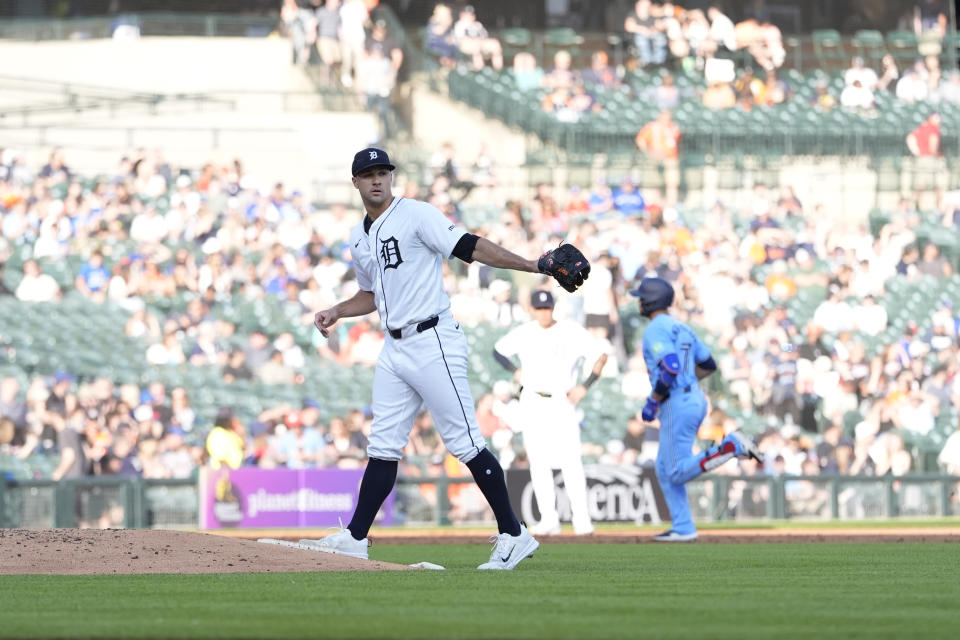 Detroit Tigers starting pitcher Jack Flaherty walks behind the mound as Toronto Blue Jays' Isiah Kiner-Falefa rounds the bases after his solo home run during the third inning of a baseball game, Thursday, May 23, 2024, in Detroit. (AP Photo/Carlos Osorio)