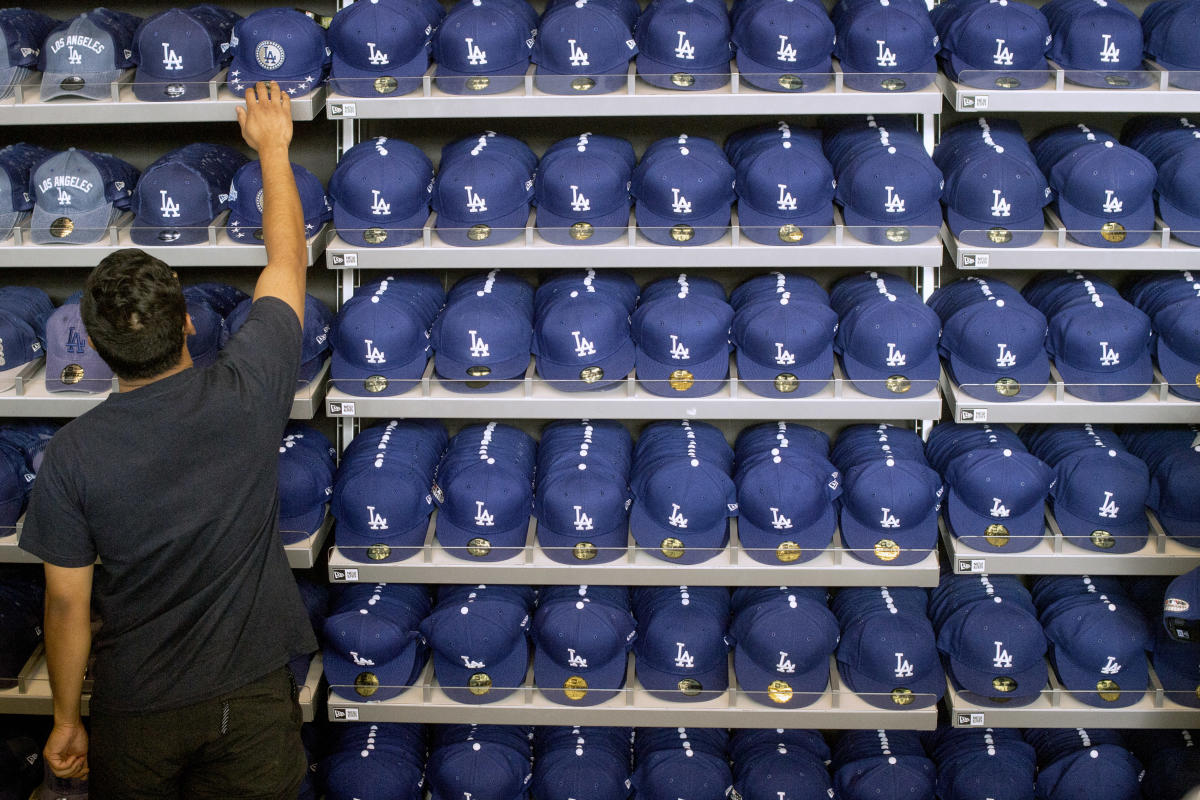 MLB-Backed New Era Cap Secures $775 Million Financing - Bloomberg