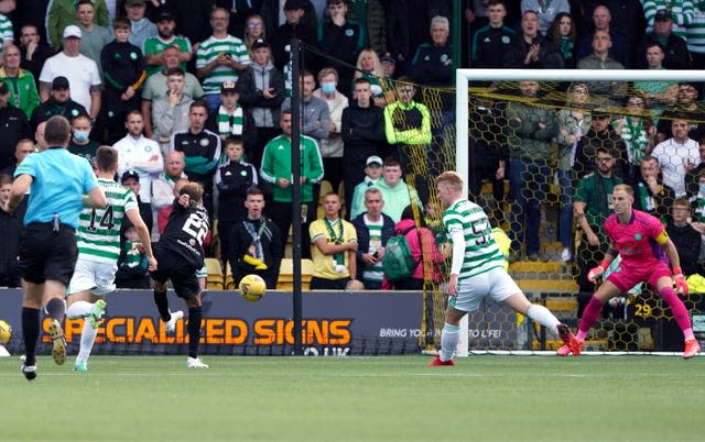 Livingston’s Andrew Shinnie scores the only goal of the game against Celtic in the cinch Premiership