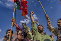 Bharatiya Janata Party (BJP) supporters shout slogans as they celebrate their party's lead during the counting of votes outside the party office in Srinagar, Indian controlled Kashmir, Tuesday, June 4, 2024. (AP Photo/Dar Yasin)