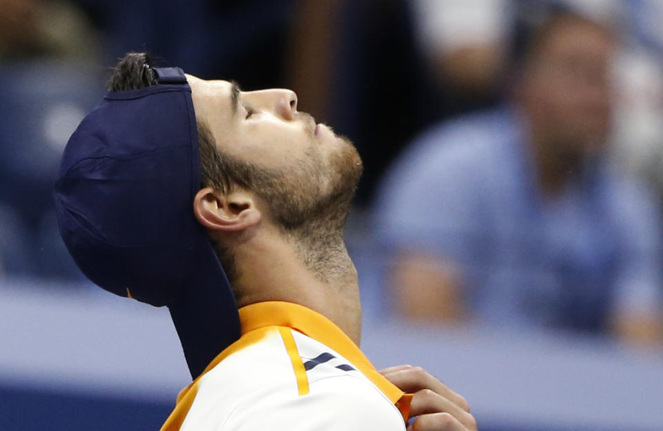 Karen Khachanov, of Russia, reacts after a point against Rafael Nadal, of Spain, during the third round of the U.S. Open tennis tournament, Friday, Aug. 31, 2018, in New York. (AP Photo/Jason DeCrow)