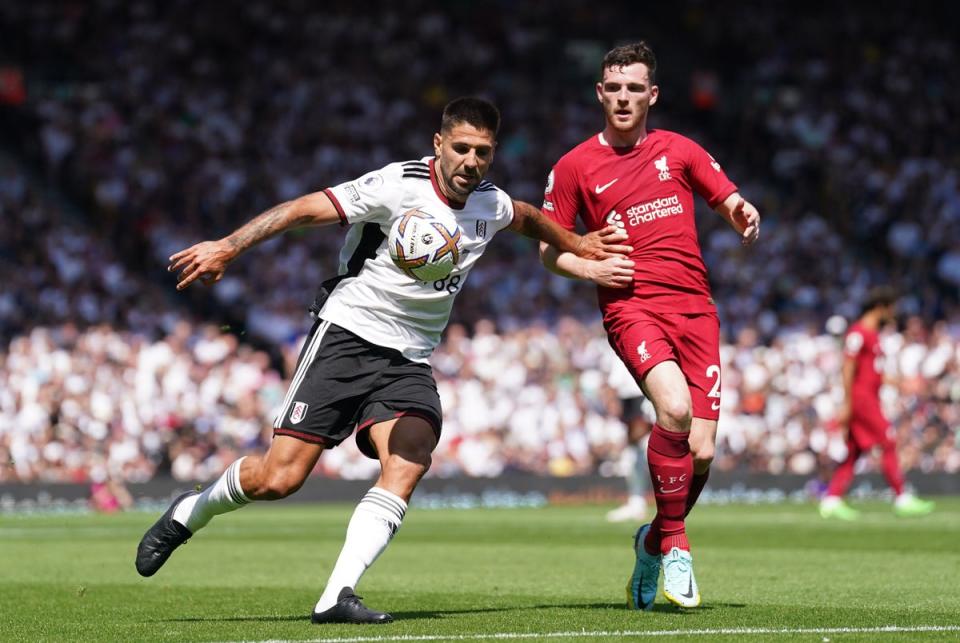 Fulham’s Aleksandar Mitrovic, left, struck twice but Liverpool grabbed a late equaliser at Craven Cottage (Adam Davy/PA) (PA Wire)