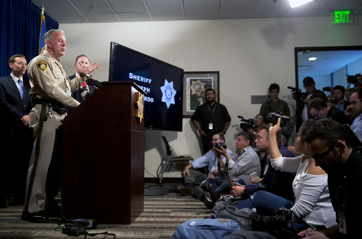 Clark County Sheriff Joe Lombardo, center, responds to a question during a media briefing at the Las Vegas Metro Police headquarters in Las Vegas, Tuesday, Oct. 3, 2017. (Steve Marcus/Las Vegas Sun via AP)