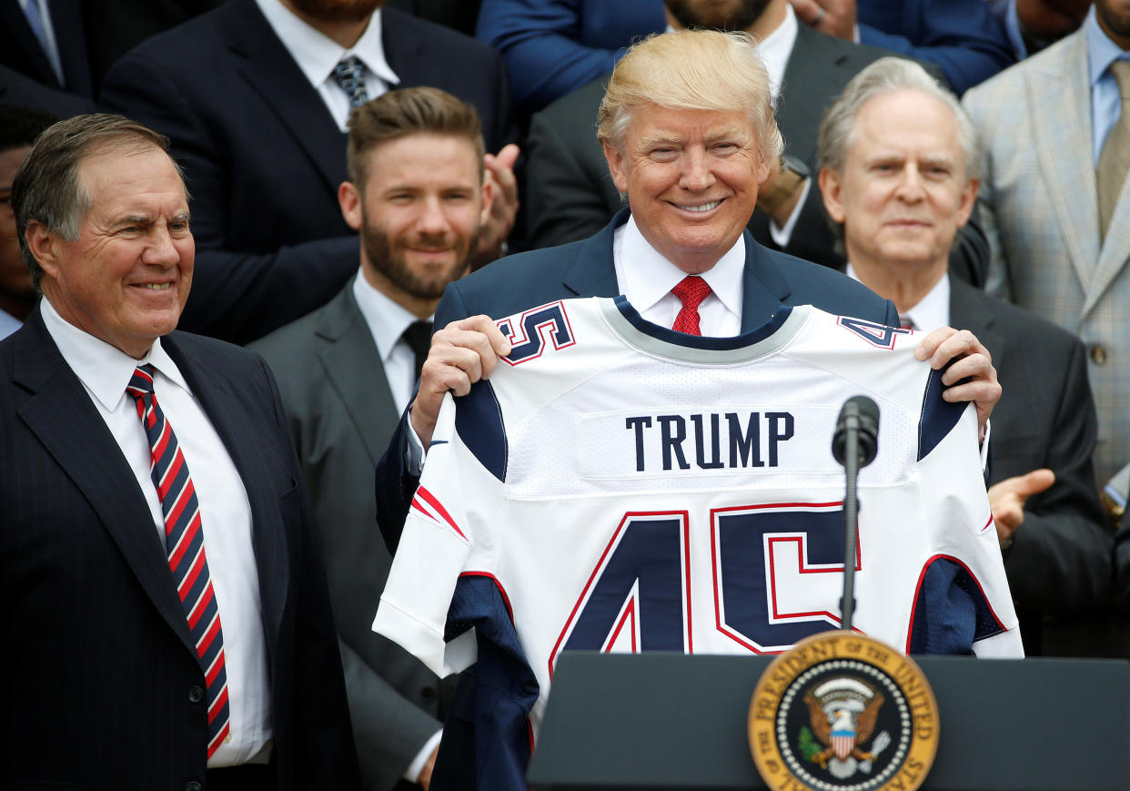 President Donald Trump holds up a New England Patriots jersey during an event at the White House honoring the Super Bowl champions on April 19, 2017.&nbsp; (Photo: Joshua Roberts / Reuters)