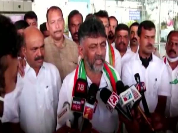 DK Shivakumar talks to reporters outside Mangalore airport (Photo/ANI)