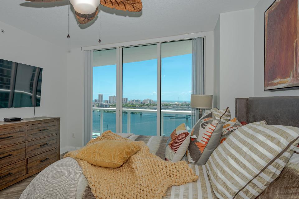 Both the main bedroom and the living room have balcony access and stunning views of the Atlantic Ocean and Intracoastal Waterway.