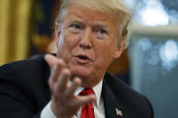 President Donald Trump speaks during an interview with The Associated Press in the Oval Office of the White House, Tuesday, Oct. 16, 2018, in Washington. (AP Photo/Evan Vucci)