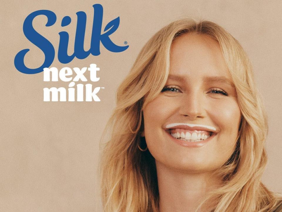 Sailor Brinkley Cook sports a milk mustache in an ad for Silk Nextmilk