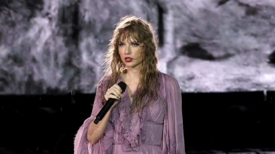 Taylor Swift performs in the rain in Nashville