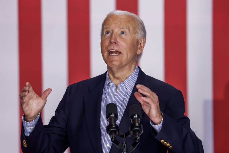 President Joe Biden looks up while campaigning at Sherman Middle School in Madison, Wis., on Friday. Photo by Tannen Maury/UPI