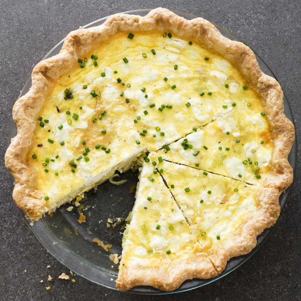 This undated photo provided by America's Test Kitchen in October 2018 shows a leek and goat cheese quiche in Brookline, Mass. This recipe appears in the cookbook “ATB Brunch.” (Daniel J. van Ackere/America's Test Kitchen via AP)