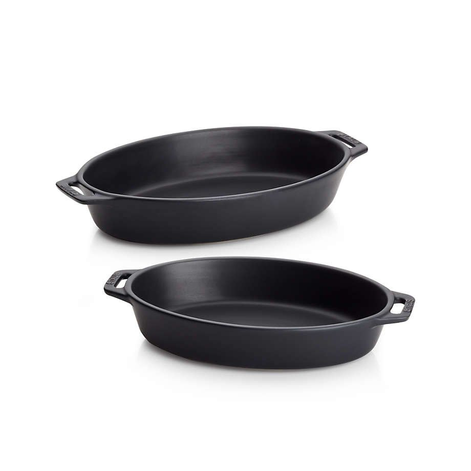 two staub oval baking dishes in matte black