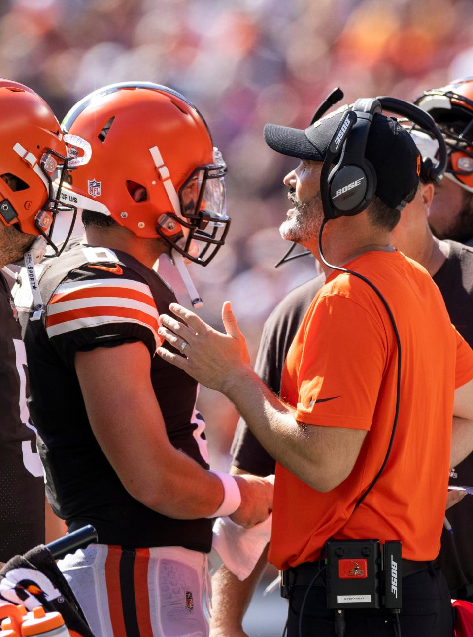 Cleveland Browns head coach Kevin Stefanski talks with quarterback Baker Mayfield on the sidelines.