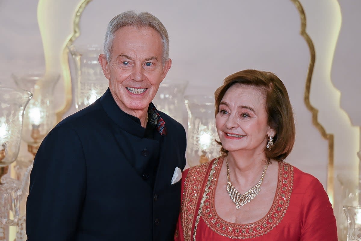 Blair with wife Cherie in Mumbai in July (AFP/Getty)