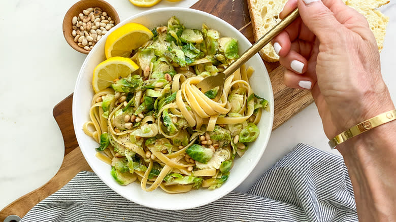 bowl of pasta with bread