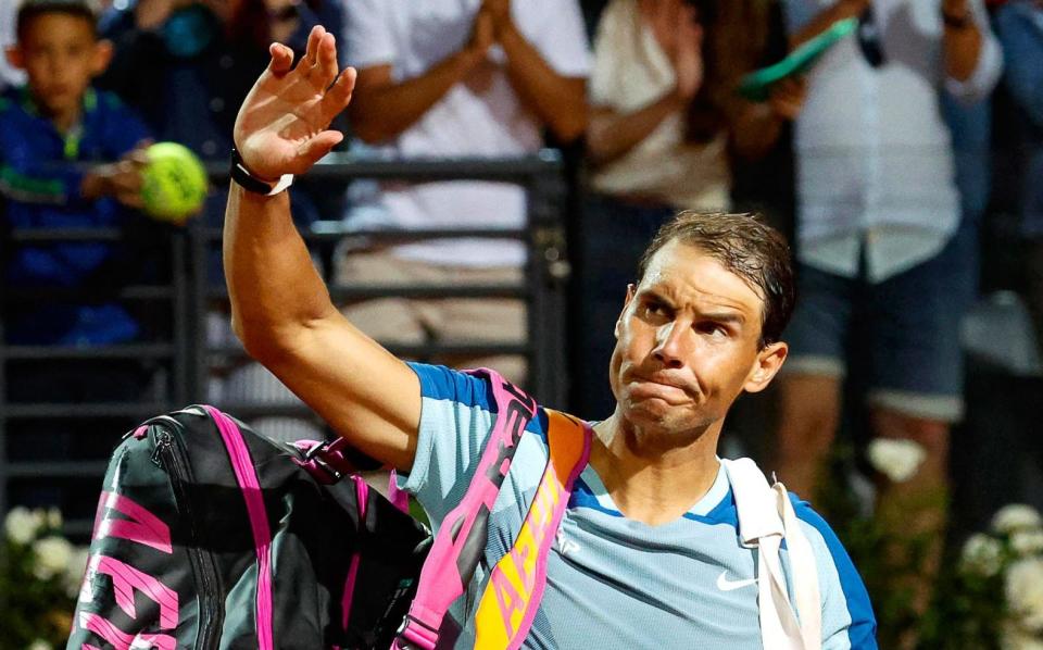 Rafael Nadal of Spain waves as he leaves the court after losing his men's singles third round match against Denis Shapovalov of Canada at the Italian Open tennis tournament in Rome, Italy, 12 May 2022 - SHUTTERSTOCK