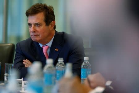 FILE PHOTO: Paul Manafort of Republican presidential nominee Donald Trump's staff listens during a round table discussion on security at Trump Tower in the Manhattan borough of New York, U.S., August 17, 2016. REUTERS/Carlo Allegri/File Photo