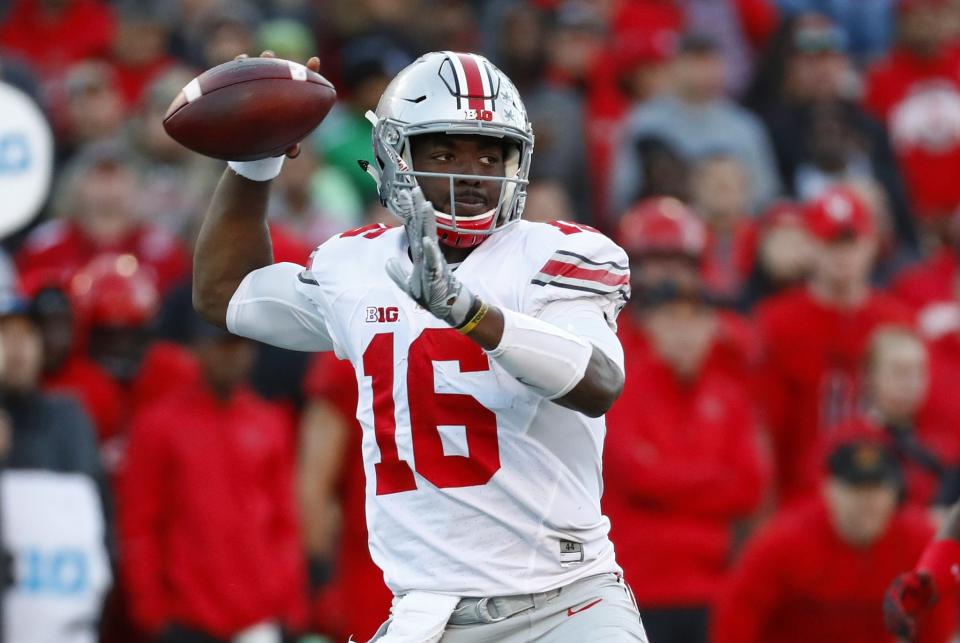 Ohio State quarterback J.T. Barrett combined for four touchdowns in a 62-3 win over Maryland. (AP Photo/Patrick Semansky)