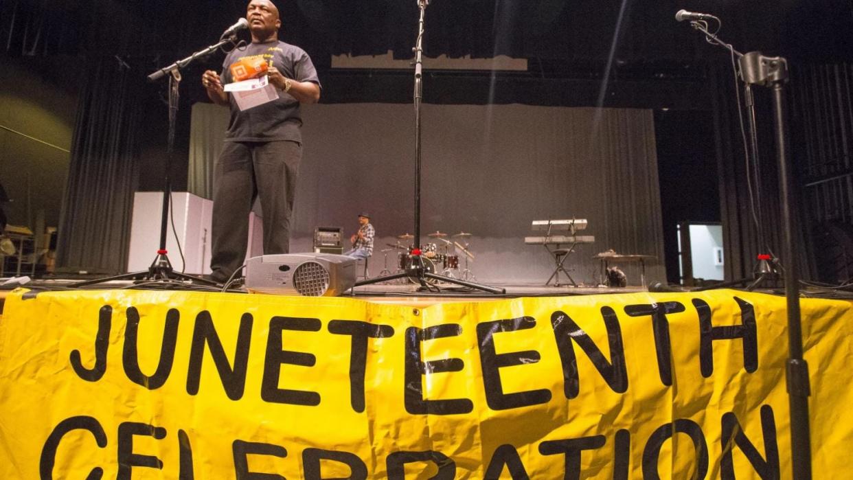 Rockford Juneteenth organizer Tommy Meeks announced raffle winners at the city's annual Juneteenth celebration on June 19, 2019, at Ellis Elementary School in Rockford.