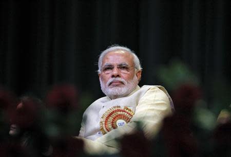 Hindu nationalist Narendra Modi, prime ministerial candidate for India's main opposition Bharatiya Janata Party (BJP) and Gujarat's chief minister, attends the Confederation of All India Traders (CAIT) national convention in New Delhi February 27, 2014. REUTERS/Stringer