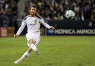 FILE -Los Angeles Galaxy midfielder David Beckham kicks during the second half of their MLS Western Conference Final playoff match against FC Dallas, Sunday, Nov. 14, 2010, in Carson, Calif. Beckham was 31 and had just finished four seasons at Real Madrid when he joined the LA Galaxy in 2007. (AP Photo/Mark J. Terrill, File)