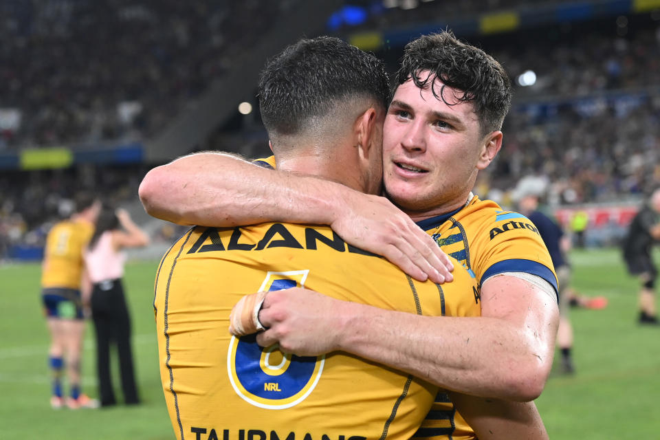 Seen here, Eels halves partners Dylan Brown and Mitchell Moses share an embrace after beating the Cowboys to become the first side into the 2022 NRL grand final. 