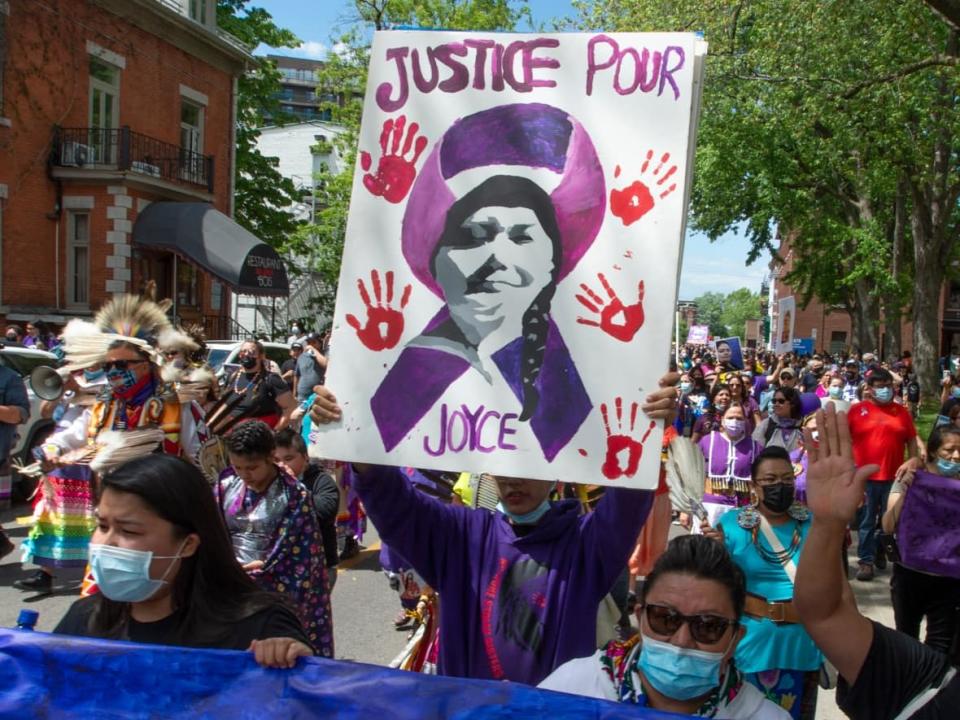 Thousands of people took part in a rally in support of Joyce Echaquan in Trois-Rivieres, Que., last year, demanding 'Justice for Joyce.' (Ryan Remiorz/The Canadian Press - image credit)