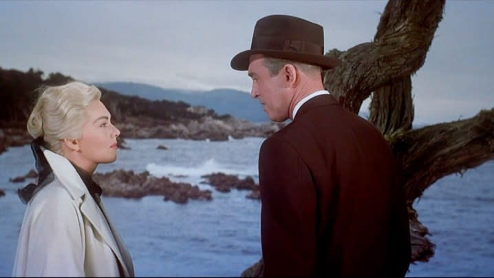 A man and a woman look at each other in Vertigo.