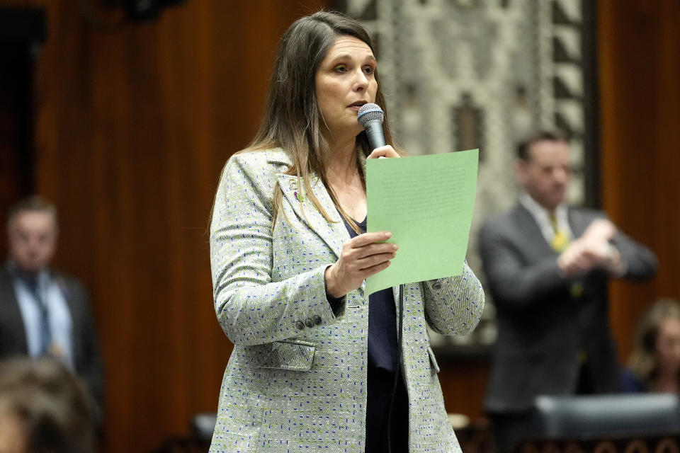 Arizona State Rep. Stephanie Stahl Hamilton, D, speaks on the House floor, Wednesday, April 17, 2024, at the Capitol in Phoenix. House Republicans have again blocked an effort for the chamber to take up legislation that would repeal Arizona’s near-total ban on abortions. (AP Photo/Matt York)