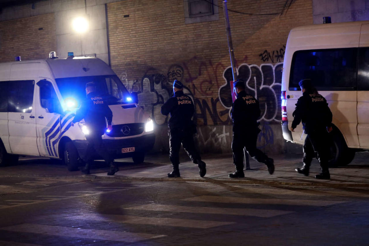 Police officers walk at the scene of a stabbing attack in Brussels, on November 10, 2022. - A Belgian police officer was killed in Brussels knife attack. (Photo by HATIM KAGHAT / BELGA / AFP) / Belgium OUT