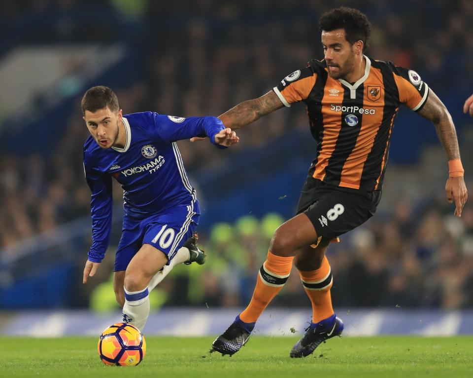 <p>Eden Hazard breezes past Tom Huddlestone </p>