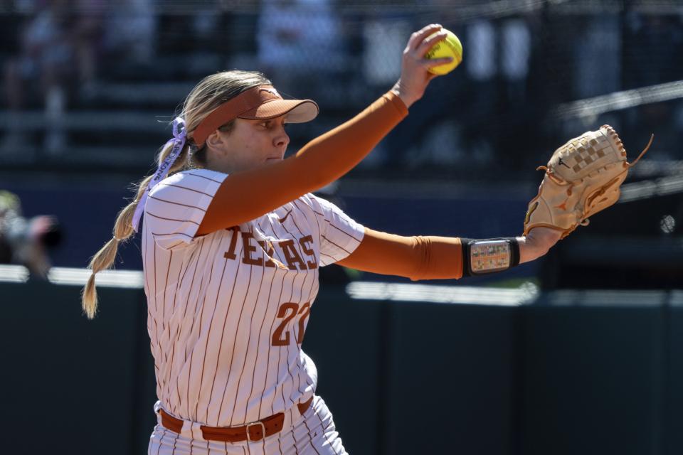 Texas' Hailey Dolcini pitched both regional final games on Sunday, the 2-1 opening-game loss to Washington and the 3-2 clinching win in the doubleheader nightcap. She threw 199 total pitches, but she made it clear that she would have her arm ready for the super regionals. “It’s hanging on,” she said of her right arm.