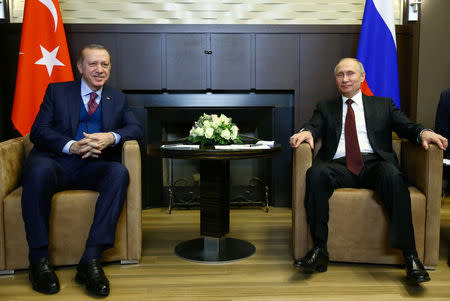 Turkish President Tayyip Erdogan meets with Russian President Vladimir Putin in Sochi, Russia, November 13, 2017. Kayhan Ozer/Presidential Palace/Handout via REUTERS