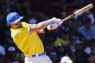 Boston Red Sox's Kevin Plawecki follows through on his two-run single during the first inning of a baseball game against the Baltimore Orioles, Sunday, Sept. 19, 2021, in Boston. (AP Photo/Michael Dwyer)