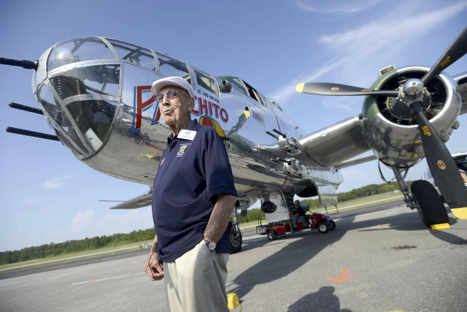 FILE - In this April 16, 2013 file photo, Doolittle Raider Lt. Col. Dick Cole, stands in front of a B-25 at the Destin Airport in Destin, Fla. before a flight as part of the Doolittle Raider 71st Anniversary Reunion. Retired Lt. Col. Richard "Dick" Cole, the last of the 80 Doolittle Tokyo Raiders who carried out the daring U.S. attack on Japan during World War II, has died at a military hospital in Texas. He was 103. A spokesman says Cole died Tuesday, April 9, 2019, at Brooke Army Medical Center in San Antonio, Texas. (Nick Tomecek/Northwest Florida Daily News via AP, File)