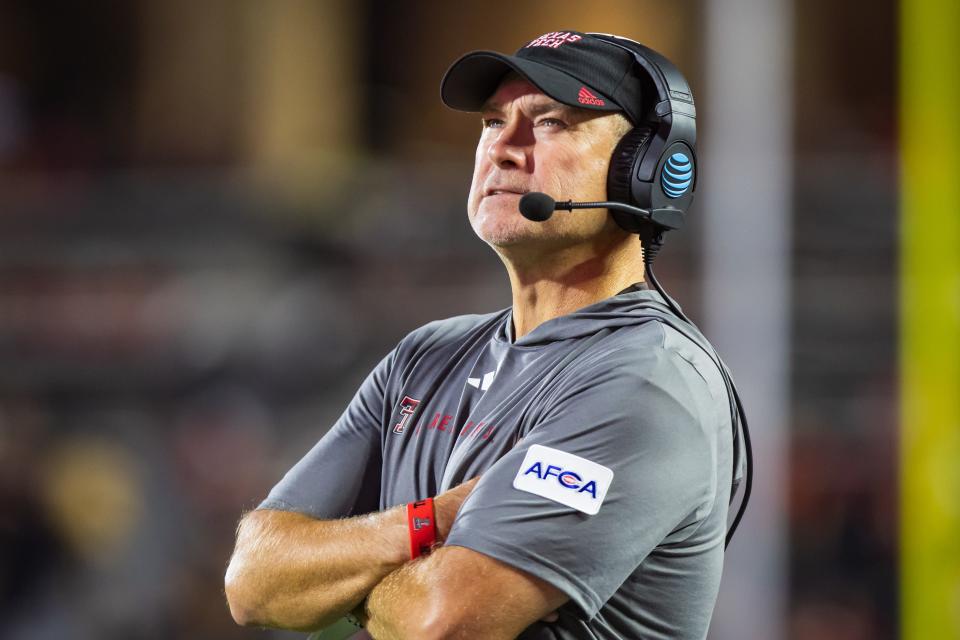 Head coach Joey McGuire of Texas Tech Red Raiders looks at the scoreboard during the second half of the game against the Abilene Christian Wildcats at Jones AT&T Stadium on August 31, 2024 in Lubbock, Texas.