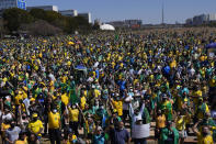 Supporters of Brazil's President Jair Bolsonar shout slogans during a pro-Bolsonaro rally at the Esplanade of Ministries, in Brasilia, Brazil, Sunday, Aug. 1, 2021. Political backers of President Bolsonaro have called for nationwide rallies to express their support for the embattled leader and his call for adding printouts to the electronic voting system. (AP Photo/Eraldo Peres)