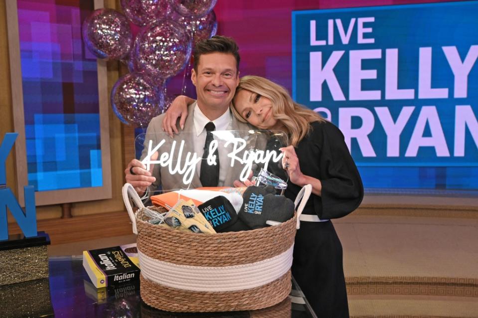 LIVE! WITH KELLY AND RYAN - 4/14/23 - It’s Ryan Seacrest’s final day on “Live! With Kelly and Ryan.” “Live! With Kelly and Ryan,” airs weekdays in syndication on ABC.  
(ABC/Lorenzo Bevilaqua) 
RYAN SEACREST, KELLY RIPA