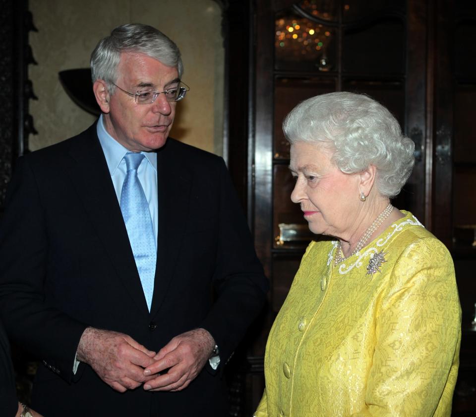 John Major, prime minister from 1990-1997, and the Queen in 2012 (Getty)