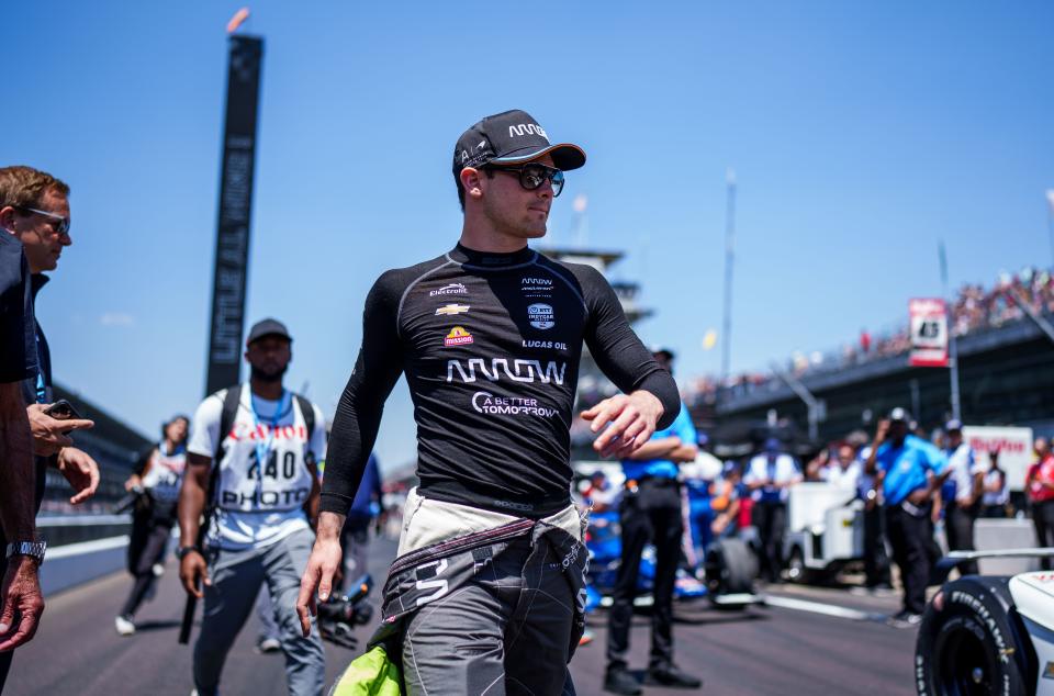 Arrow McLaren SP driver Pato O'Ward (5) makes his way to his car Sunday, May 21, 2023, during the Top 12 qualifying session at Indianapolis Motor Speedway in preparation for the 107th running of the Indianapolis 500.