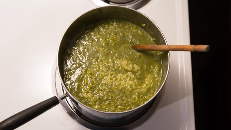 green blended soup in pot