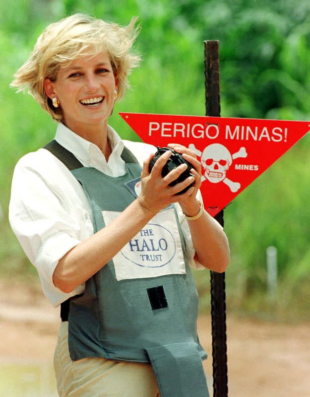 FILE PHOTO: Diana, Princess of Wales holds a landmine in one of the safety corridors of the landmine field in Huambo, Angola