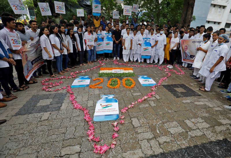 Celebrations after India administers 2 billion doses of vaccinations against COVID-19, in Ahmedabad