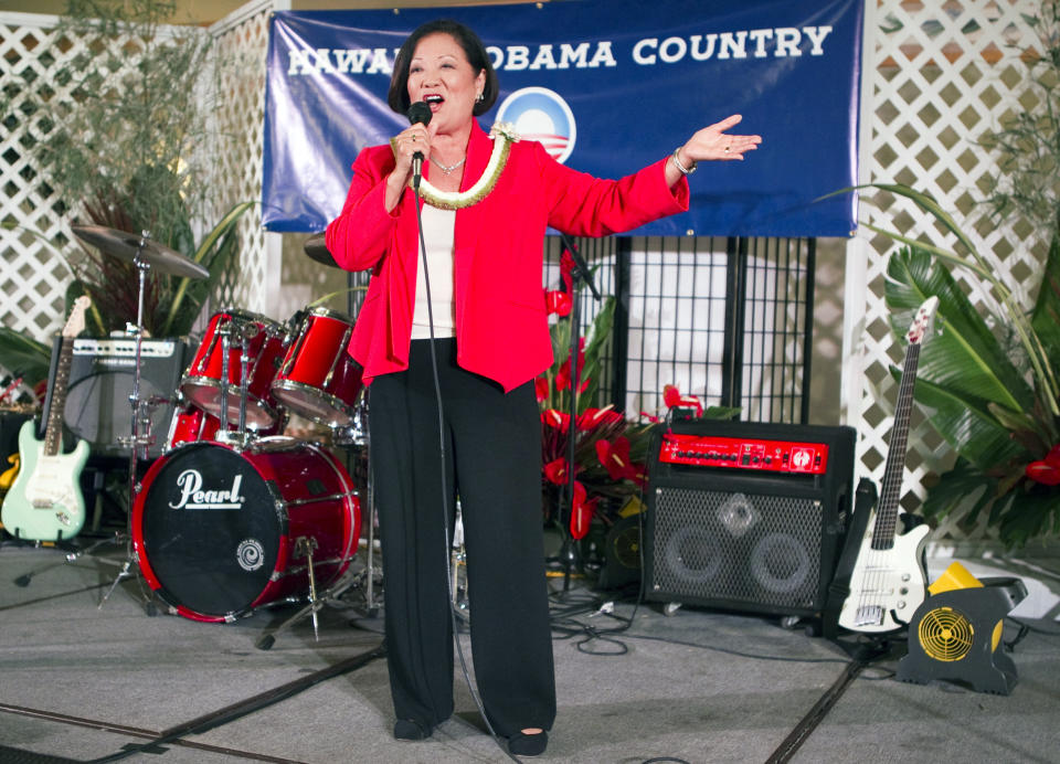 FILE - In this Tuesday, Nov. 6, 2012 file photo, U.S. Rep. Maize Hirono gives a victory speech at the Japanese Cultural Center in Honolulu. Hirono will be one of a record 20 women, and the first Asian-American woman, in the next Senate, 17 of them Democrats. (AP Photo/Marco Garcia)