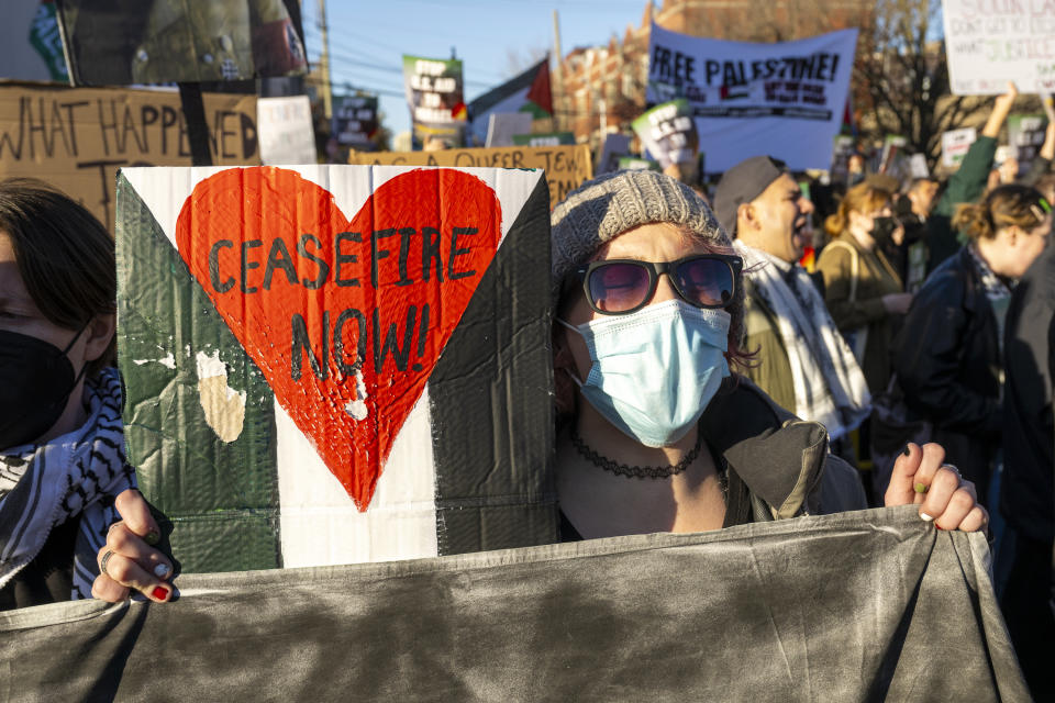 FILE - About a thousand Palestinian and pro-Palestinian demonstrators rallied at the corner of W. Hubbard St. and N. Armour St. near where President Joe Biden was attending a fundraising event in the West Town neighbohood of Chicago, Nov. 9, 2023. (Tyler Pasciak LaRiviere/Chicago Sun-Times via AP, File)