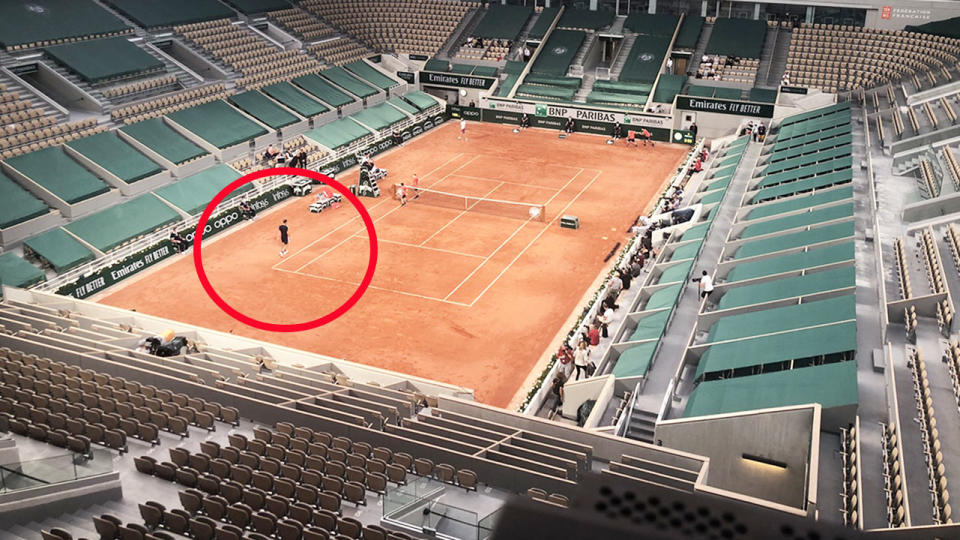 Daniil Medvedev and Stefanos Tsitsipas, pictured here playing their French Open quarter-final in an empty stadium.