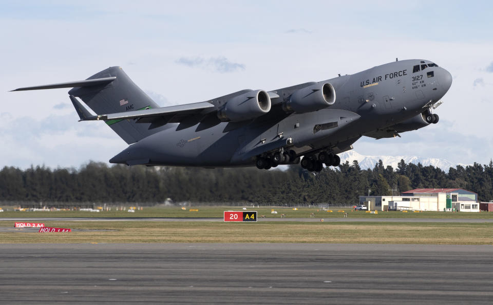 A U.S. Air Force C-17 takes off from Christchurch Airport in the season's first flight to McMurdo Station in Antarctica, Monday, Sept. 14, 2020. The first U.S. flight into Antarctica following months of winter darkness left from New Zealand Monday with crews extra vigilant about keeping out the coronavirus. (AP Photo/Mark Baker)