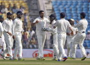 India's Ravichandran Ashwin (4th L) celebrates with his team mates after taking the wicket of South Africa's Dean Elgar (unseen) during the second day of their third test cricket match in Nagpur, India, November 26, 2015. REUTERS/Amit Dave